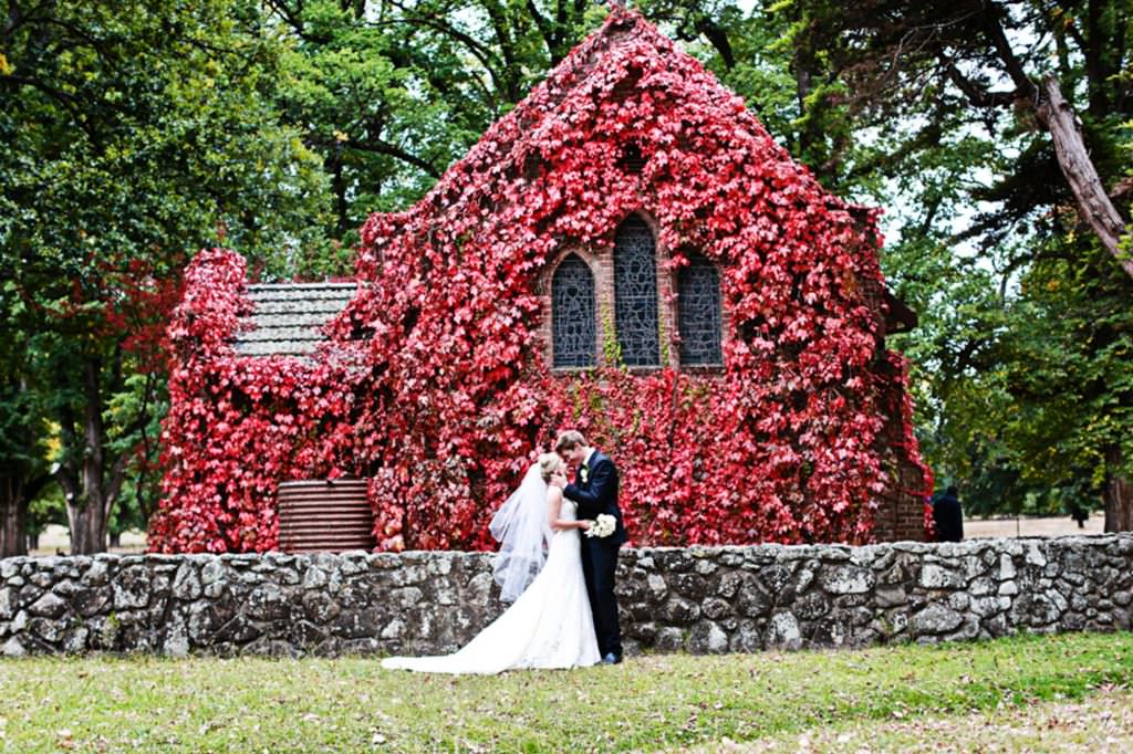 a red gostwyck church in Uralla for a wedding photo