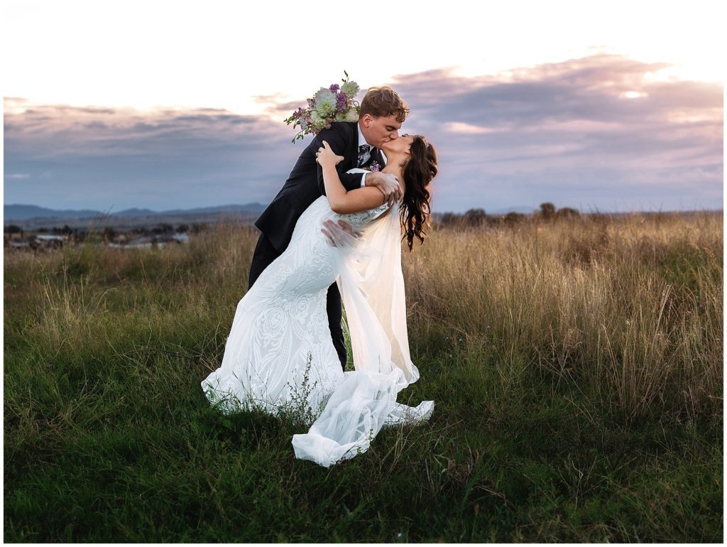 dip kiss for a bride and groom as the sunsets over Tamworth