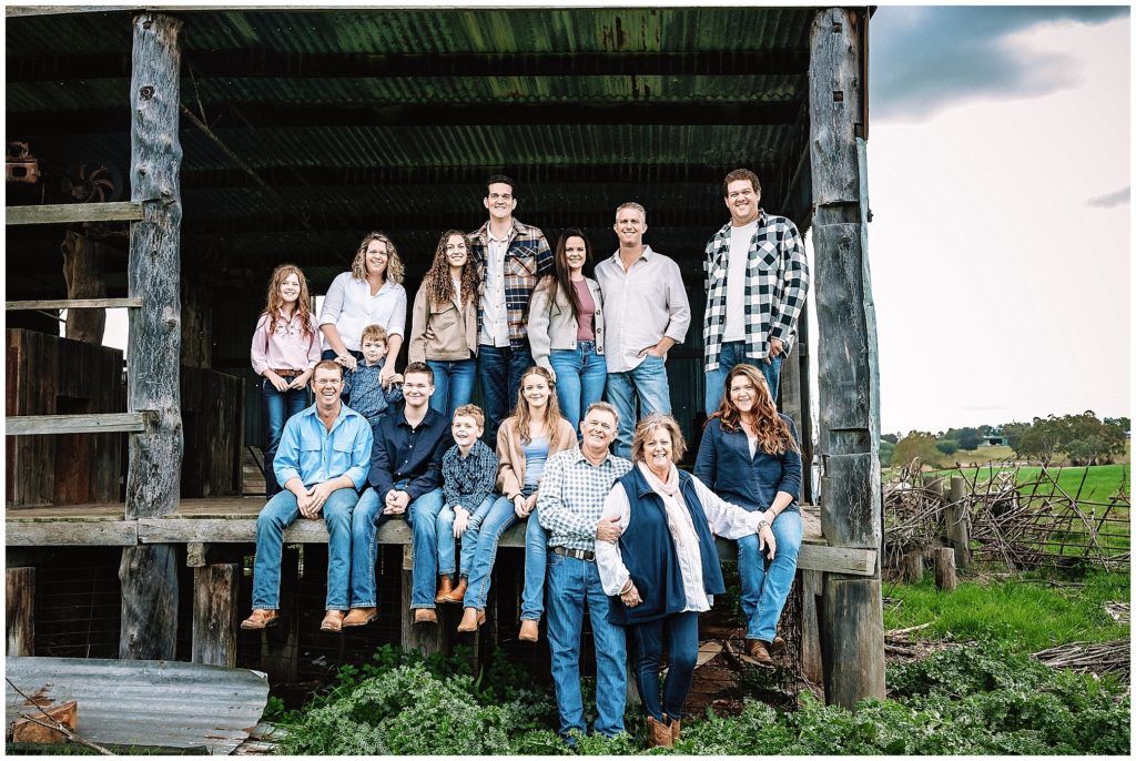 an extended family in an australian woolshed look out