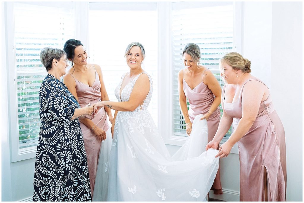 @image photography wedding a bride and bridesmaids and mum get ready