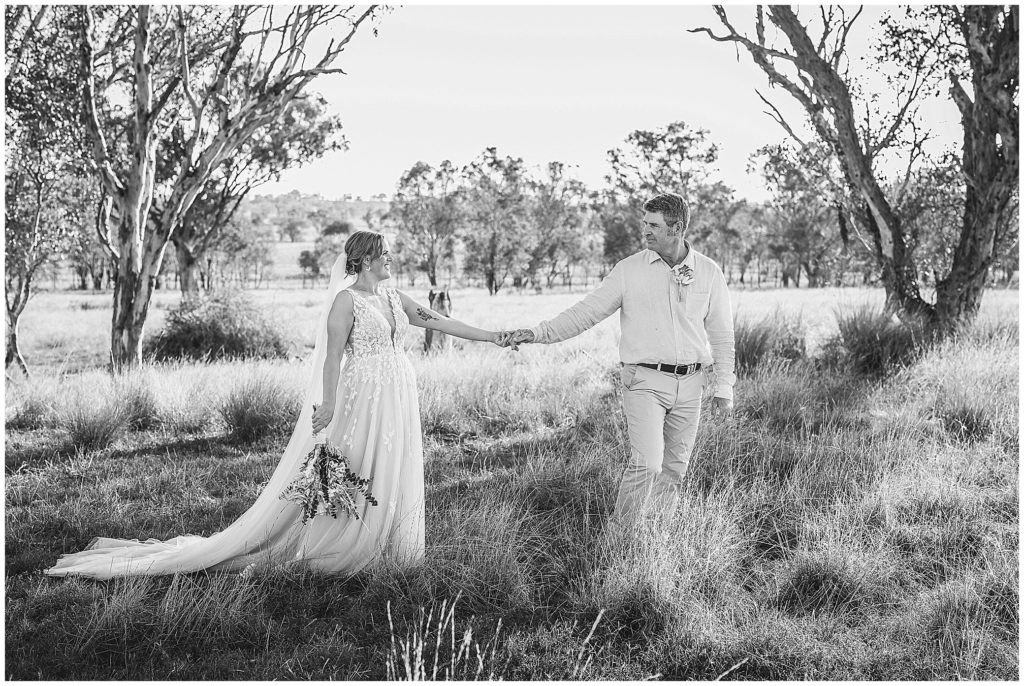 black & white photos at Dathem park woolshed a couple walk in the long grass