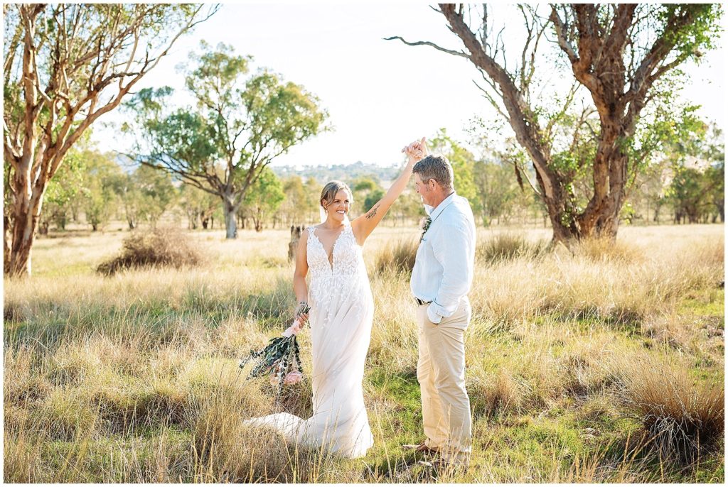 wedding photos as a couple dances at Dathem park woolshed