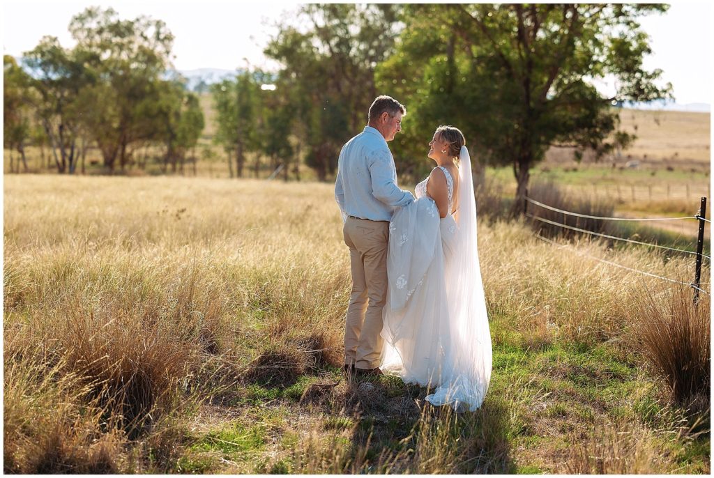 wedding photosin the long grass at Dathem park woolshed