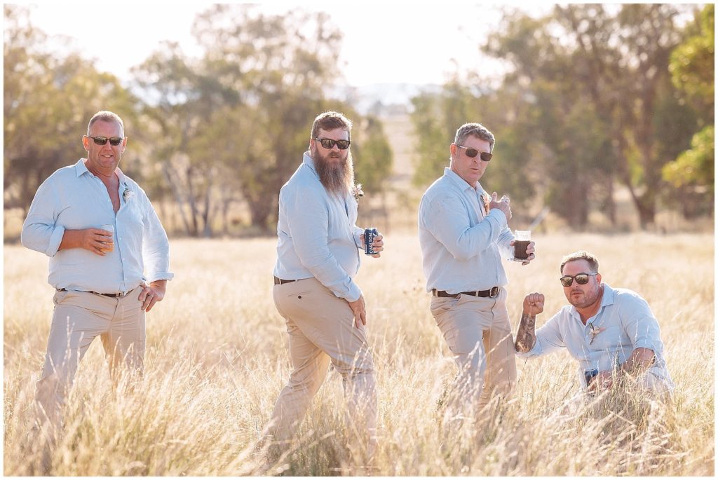 boys wedding long grass