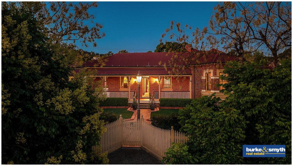 a shot at dusk of a heritage house for sale by Burke & Smyth Tamworth