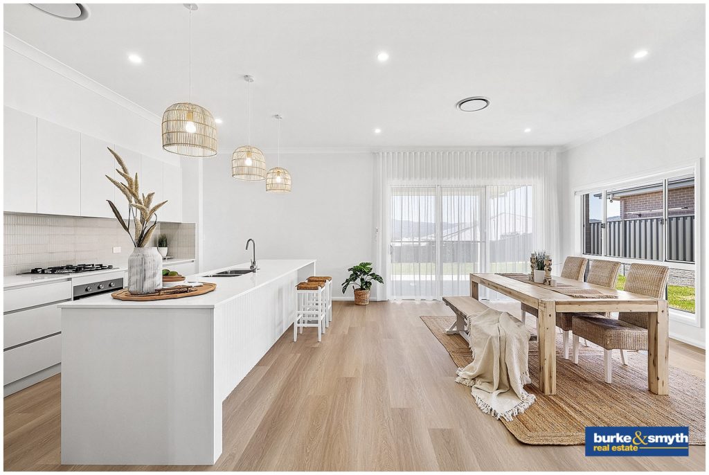 stunning timber floor & white kitchen that is part of a home for sale by Burke & smyth the real estate photographer, Karissa Tuckwell captures the light & timber in a white room