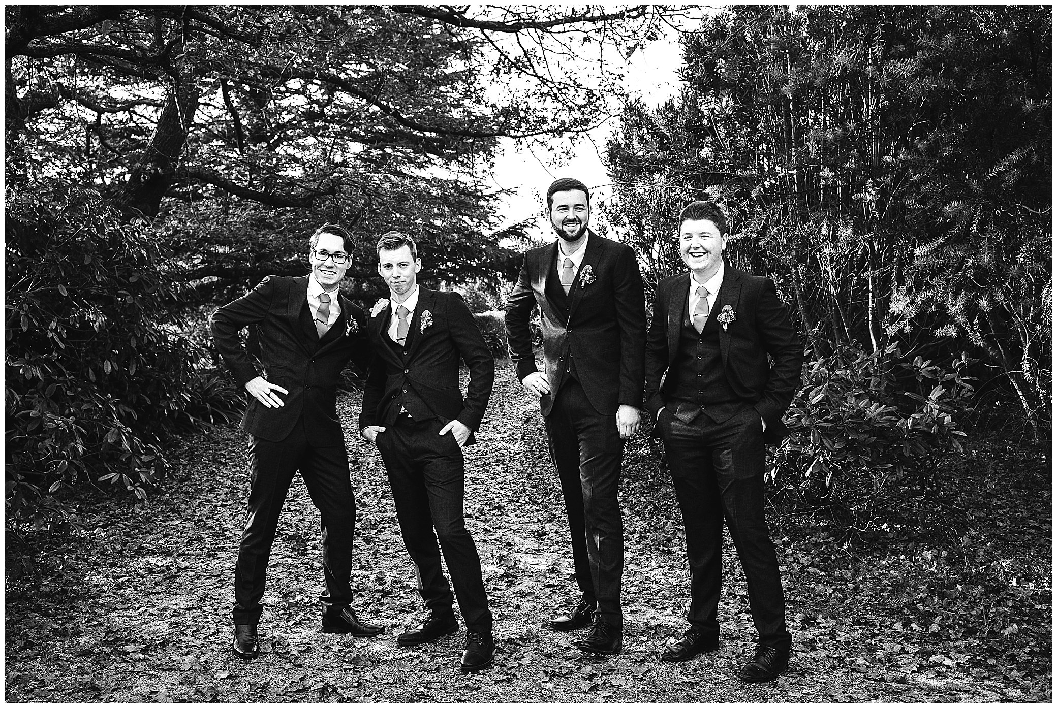 grooms men in a black and white photo on the outskirts of Uralla