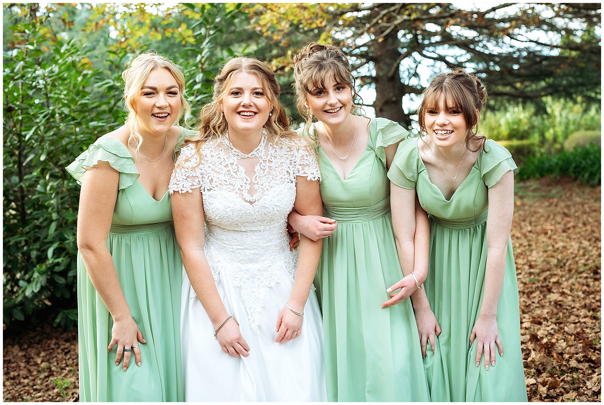 laughs together in Uralla NSW of a bride & her friends in mint green