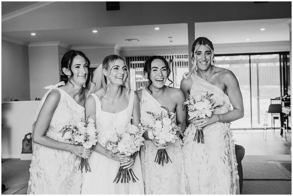 smiles and laughs black and white photo