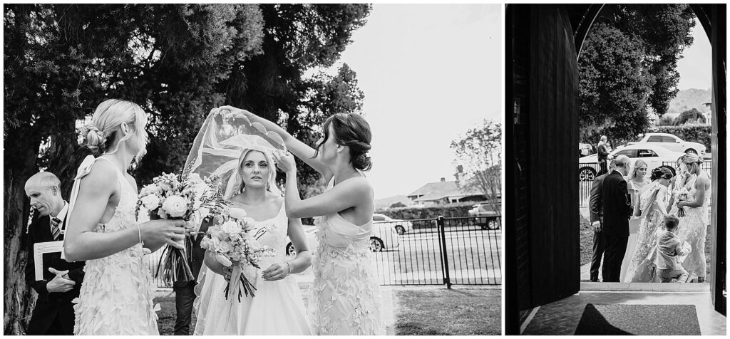 bridesmaid pop the veil over a brides head before she walks down the aisle at church