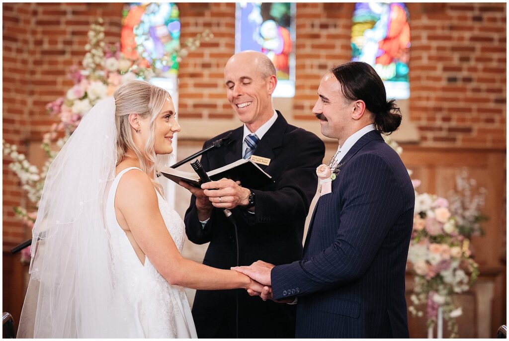 a couple say their vows in a Manilla NSW Church wedding
